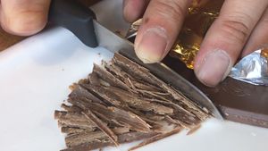Coffee Recipes > Slicing Leonidas Salted Caramel Chocolate for Latte Macchiato